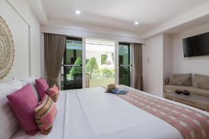Arkbar Beach Club客房内的一张或多张床位