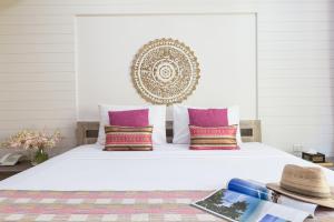 Arkbar Beach Club客房内的一张或多张床位