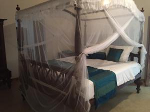 Ένα ή περισσότερα κρεβάτια σε δωμάτιο στο Lali Villa & Fruit Garden +63 φωτογραφίες