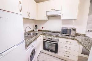 Kuchyň nebo kuchyňský kout v ubytování Rentaliday Vip Rooms