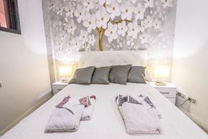 Postel nebo postele na pokoji v ubytování Rentaliday Vip Rooms