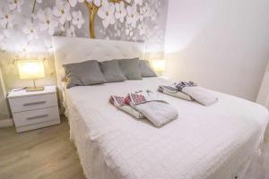 Postel nebo postele na pokoji v ubytování Rentaliday Vip Rooms
