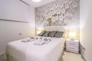 Postel nebo postele na pokoji v ubytování Rentaliday Vip Rooms