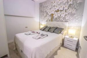 Postel nebo postele na pokoji v ubytování Rentaliday Vip Rooms