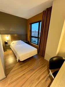 Postel nebo postele na pokoji v ubytování Hotel Duero