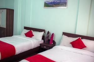Letto o letti in una camera di Hotel Elite Pokhara