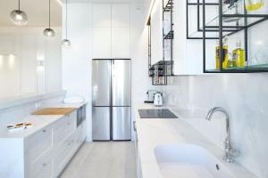 Kuchyňa alebo kuchynka v ubytovaní Appartement de standing Biarritz