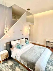 Posteľ alebo postele v izbe v ubytovaní Appartement de standing Biarritz