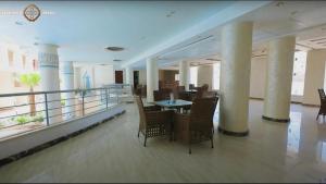 A restaurant or other place to eat at Casablanca beach resort, first line with private beach and swimming pools,