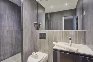 Kúpeľňa v ubytovaní Residence Center of Paris le Marais by Studio prestige