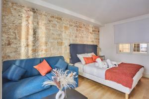 Posteľ alebo postele v izbe v ubytovaní Residence Center of Paris le Marais by Studio prestige