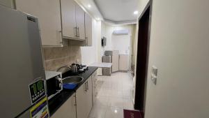A kitchen or kitchenette at Casablanca beach resort, first line with private beach and swimming pools,