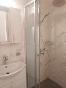 Koupelna v ubytování Galatex Beach Apartment + 37 fotografií