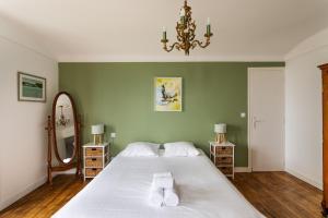 Posteľ alebo postele v izbe v ubytovaní Le Tangon - Maison de 150m2 face à la mer