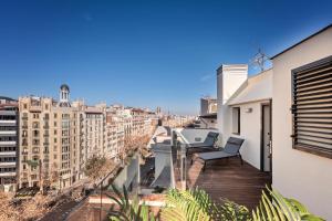 a balcony with a view of a city at Sweet Inn - Palau in Barcelona