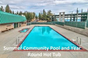 a large swimming pool in front of a building at Tahoe Olympic condo in Stateline