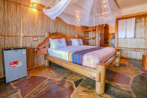Postel nebo postele na pokoji v ubytování Ziwa Beach Resort