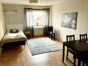 Krevet ili kreveti u jedinici u okviru objekta Sandvikens Företagsboende