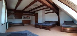 Postel nebo postele na pokoji v ubytování Apartmán Na Kamenu