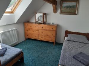 Postel nebo postele na pokoji v ubytování Apartmán Na Kamenu