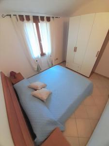 Postel nebo postele na pokoji v ubytování Nuova valmar I Ginepri "Lorenzo" Vista mare