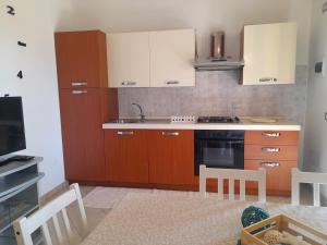 Kuchyň nebo kuchyňský kout v ubytování Nuova valmar I Ginepri "Lorenzo" Vista mare