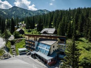 an aerial view of a building in the mountains at Mein Appartement Nr.9 in Planneralm
