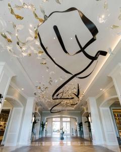 a large art installation on the ceiling of a building at Park Hyatt Aviara in Carlsbad