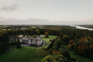 an aerial view of a mansion with a river at Belleek Castle, Ballina in Ballina