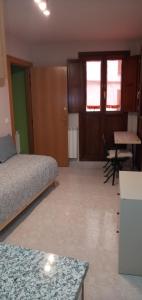 A bed or beds in a room at Coqueto Estudio 1