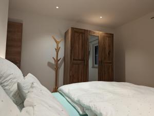 Postel nebo postele na pokoji v ubytování ApartSchön