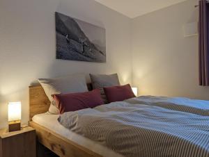 Postel nebo postele na pokoji v ubytování ApartSchön