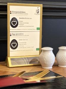 Ein Zertifikat, Auszeichnung, Logo oder anderes Dokument, das in der Unterkunft Boutique-Hotel Stadtvilla Hodes ausgestellt ist
