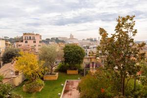 a view of the city from the roof of a building at iFlat Spanish Steps at your Feet in Rome