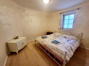 Postel nebo postele na pokoji v ubytování Apartmán Provence Bystrá Chopok 1