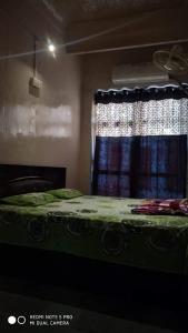Łóżko lub łóżka w pokoju w obiekcie Savitri Palace