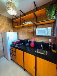 Η κουζίνα ή μικρή κουζίνα στο Bem te quero pipa- Chalé Térreo