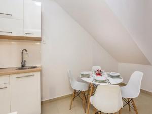 Kuchyň nebo kuchyňský kout v ubytování Apartments Villa Kim + 19 fotografií