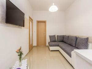 TV a/nebo společenská místnost v ubytování Apartments Villa Kim