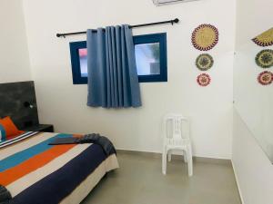 Ponta Mar Resort客房内的一张或多张床位