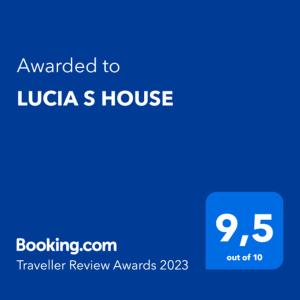 a blue sign that says awarded to lubica s house at LUCIA S HOUSE in Mairena del Aljarafe