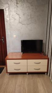 TV a/nebo společenská místnost v ubytování Good Inn