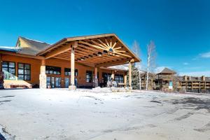 a large building with a wooden roof at The Inn at Silvercreek 633 in Granby