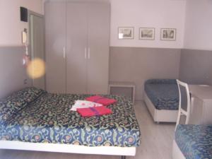 Postel nebo postele na pokoji v ubytování Hotel Imperiale & SPA