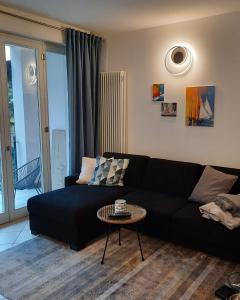 A seating area at Fantastic Lake Como apartment