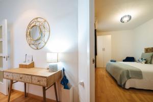 Cama o camas de una habitación en Apartamento exclusivo junto a la catedral de Sevilla