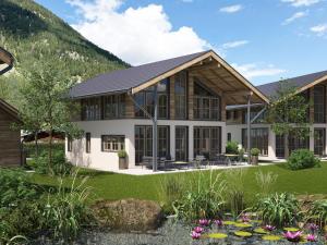 a rendering of a house with a pond at Cosy, new chalet with garden and private sauna in Bichlbach