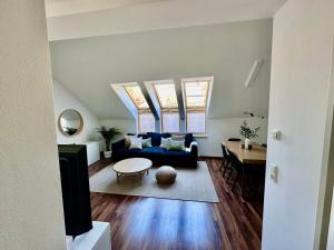 A bed or beds in a room at Designer Apartment im Herzen von Fulpmes