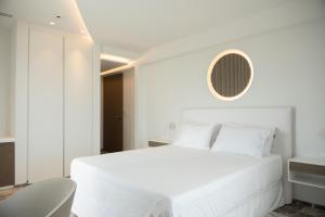 Letto o letti in una camera di Tzanis Resort Skyros