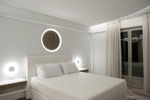 Letto o letti in una camera di Tzanis Resort Skyros